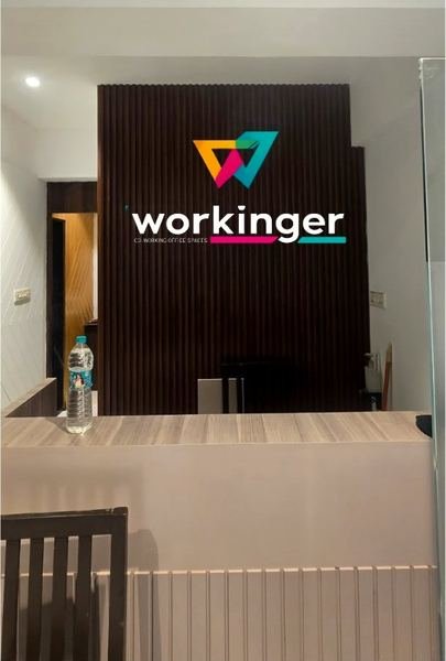 Workinger reception desk with the Workinger logo, West High Court Road, Dharampeth